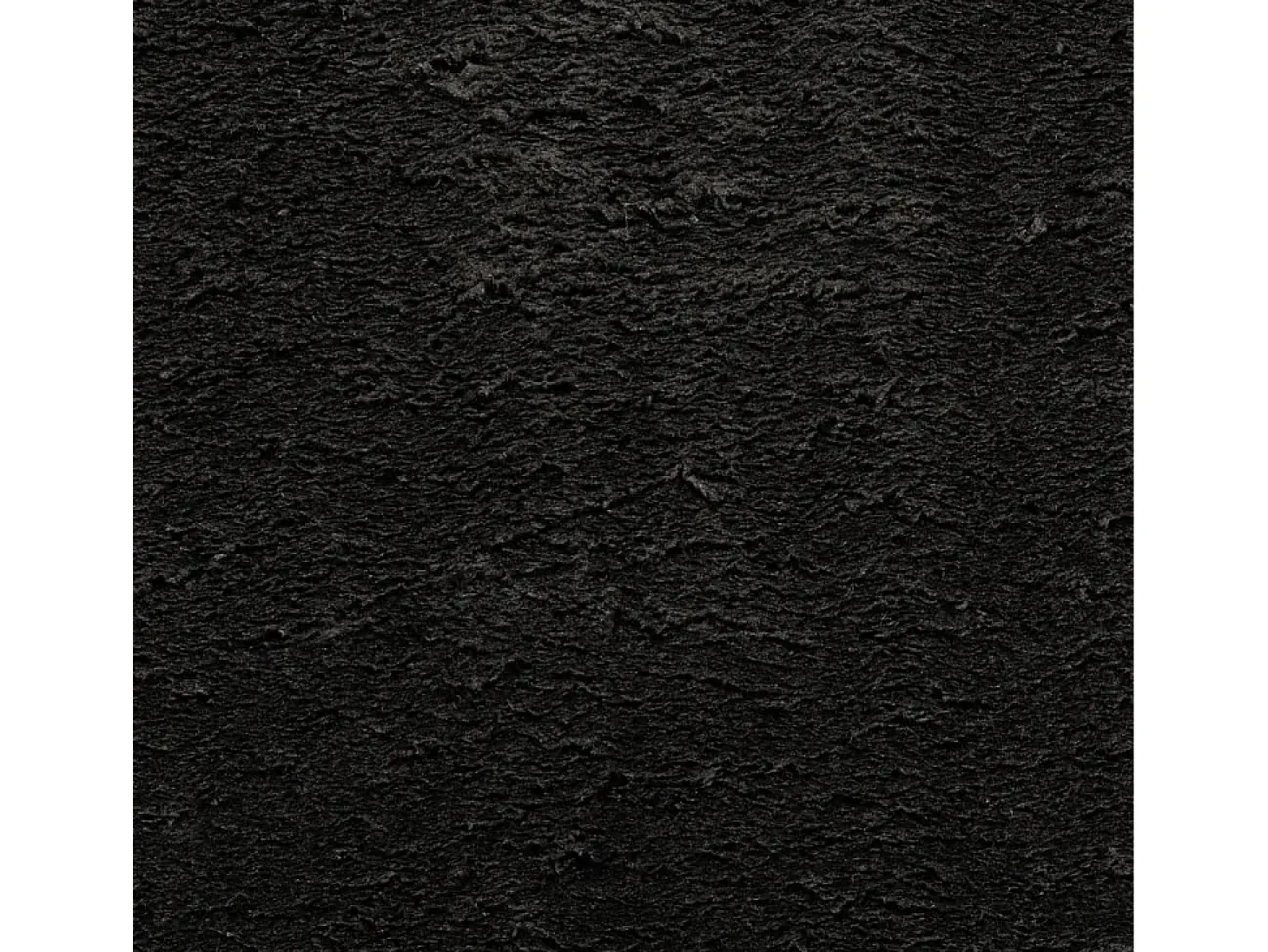 Alfombra HUARTE de pelo corto suave y lavable en color negro Ø 120 cm