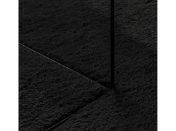 Alfombra HUARTE de pelo corto suave y lavable en color negro Ø 120 cm