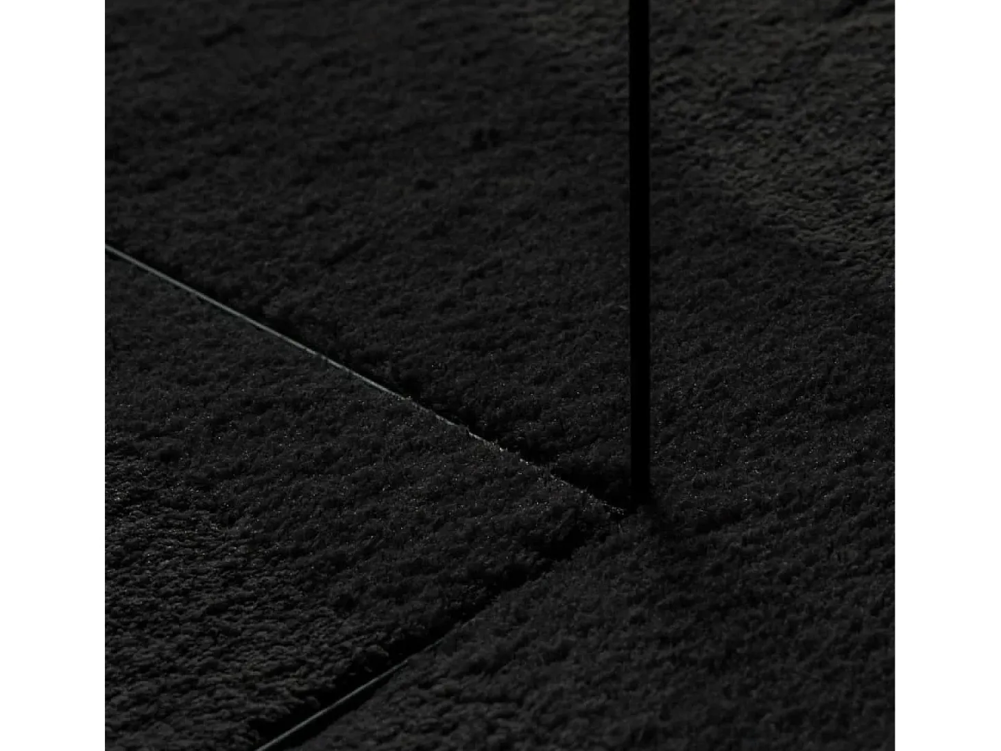 Alfombra HUARTE de pelo corto suave y lavable en color negro Ø 160 cm