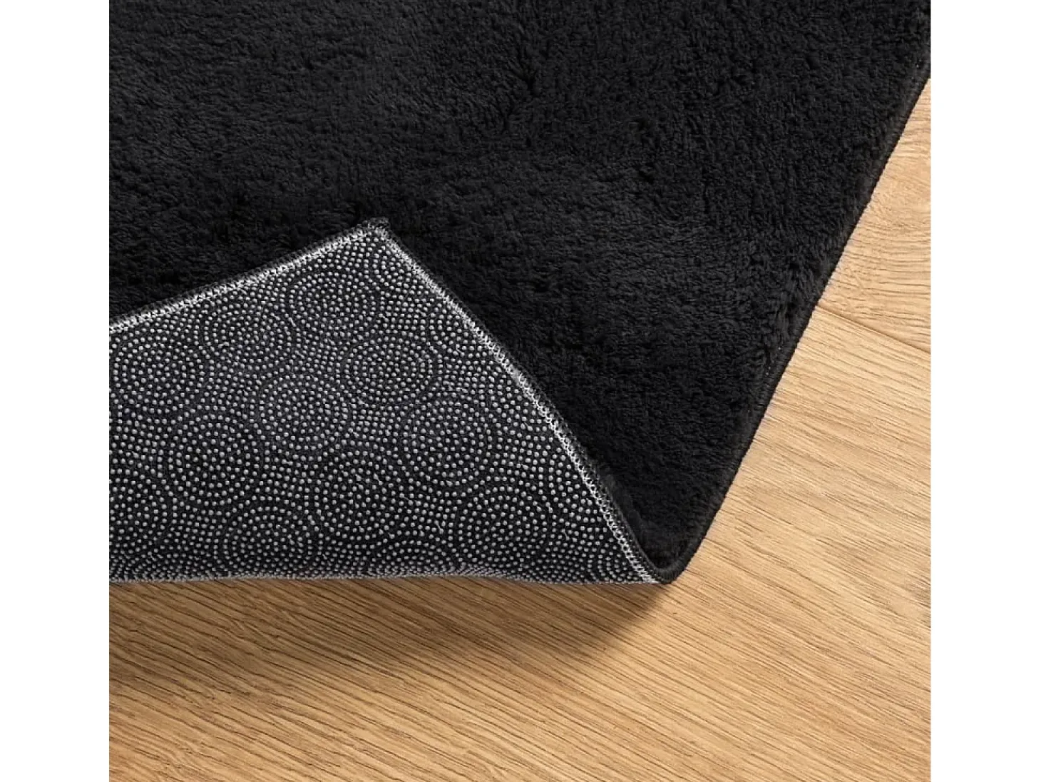 Alfombra HUARTE de pelo corto suave y lavable negra 120x170 cm