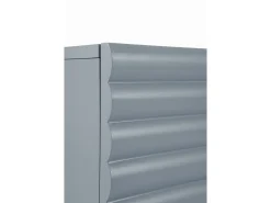 Aparador azul con relieve ondulado en puertas y cajones