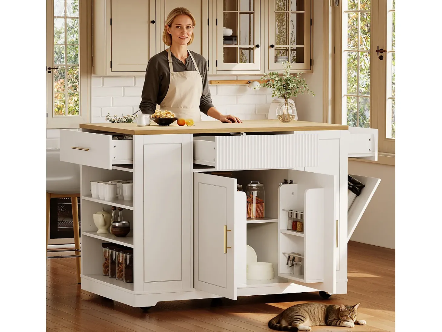 Carrito de cocina blanco con 2 puertas, 3 cajones y compartimento para basura, tiradores de metal, superficie con veta de madera.