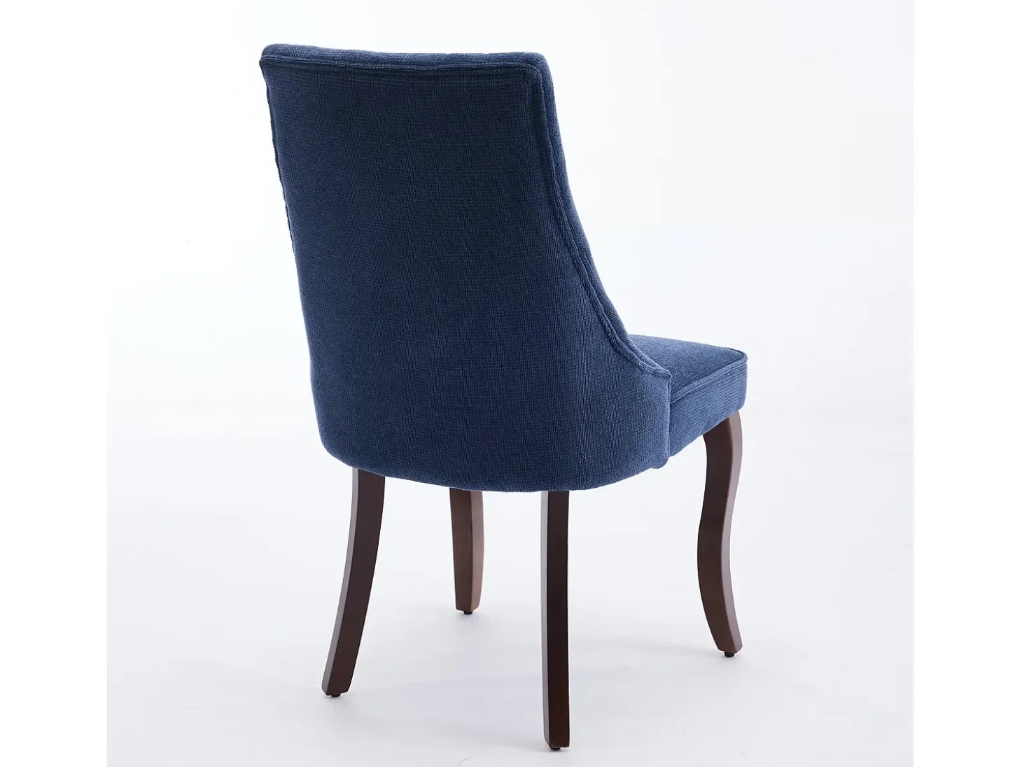 Conjunto de 2 sillas azules con patas de madera curvadas y respaldo alto.