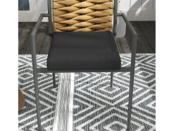 Conjunto de 2 sillas con reposabrazos, respaldo de ratán, estructura de acero con cojín acolchado extraíble, color negro.