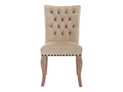 Juego de 2 sillas de terciopelo camel claro con patas de madera curvadas y remaches negros.