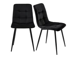 Juego de 4 sillas de terciopelo negro con patas de metal negro.