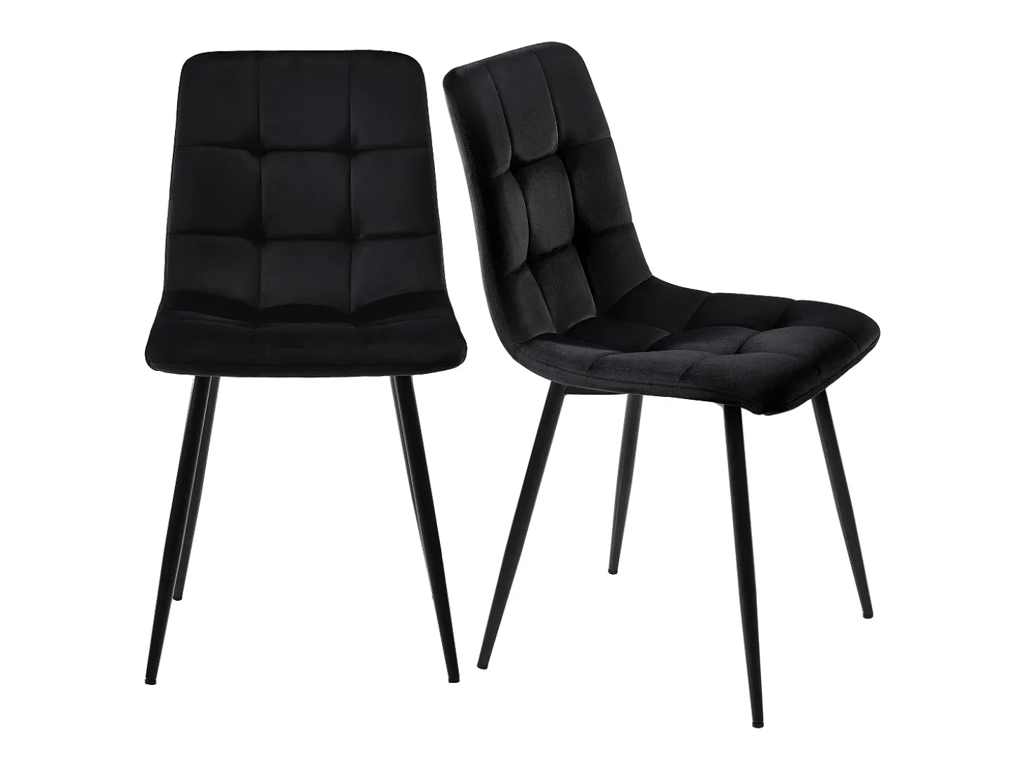 Juego de 4 sillas de terciopelo negro con patas de metal negro.