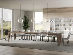 Mesa de comedor extensible de madera Naxo.-Color Marrón-Base y soporte con ruedas-5 alargaderas finas-Ancho extensible