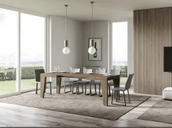 Mesa de comedor extensible de madera Naxo.-Color Marrón-Base y soporte con ruedas-5 alargaderas finas-Ancho extensible