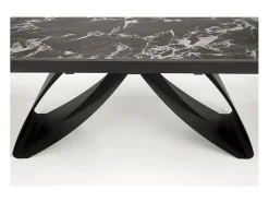 Mesa de comedor extensible Lizzy con tablero de mármol negro y pata central