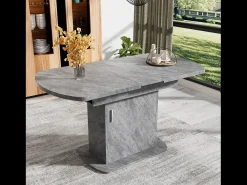 Mesa de comedor extensible ovalada con espacio de almacenaje, diseño moderno, aspecto hormigón, con tirador plateado (110/130x70x75 cm)