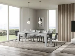 Mesa de comedor extensible de madera Naxo.-Color Gris cemento-Soporte 4 pies-Alargaderas -Ancho extensible