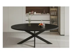 Mesa de comedor ovalada BOURGIA de madera maciza de Mangolia negra, ideal para un comedor acogedor.