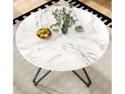 Mesa de comedor redonda 100x100x76cm con tablero chapado en mármol blanco, estructura regulable de metal negro.