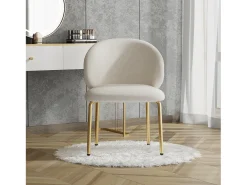 Silla de chenilla beige con patas de metal dorado