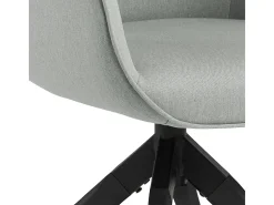 Silla de comedor Aura patas negras, con reposabrazos y retorno giratorio gris claro.