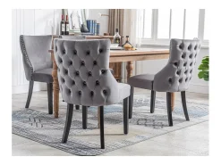 Silla de comedor de terciopelo gris con cómodas patas de madera maciza y diseño acolchado, juego de 2