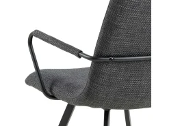 Silla de comedor Selina con reposabrazos color gris.