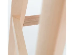 Taburete alto nórdico con cojín de polipiel amarillo curry y patas de haya clara Tula 76 cm
